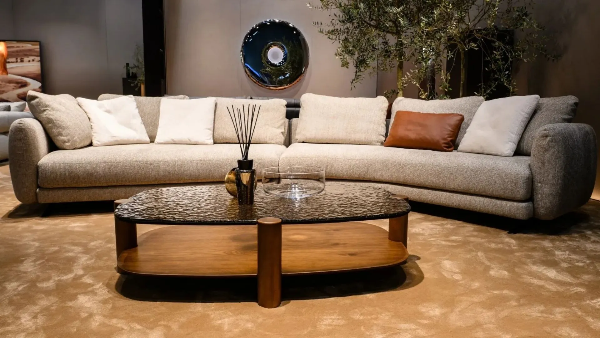 The Asymmetrical Cluster: Masterclass in Grouping Differing Shapes and Materials into a Single Coffee Table Statement
